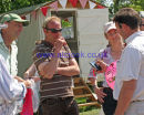 Bill Levett & Leonard Goerens can only look on in wonder as Clayton Fredericks demonstrates smart phone technology